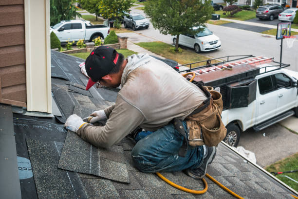 Professional Flat Roof Repair technician working in Delong, IN